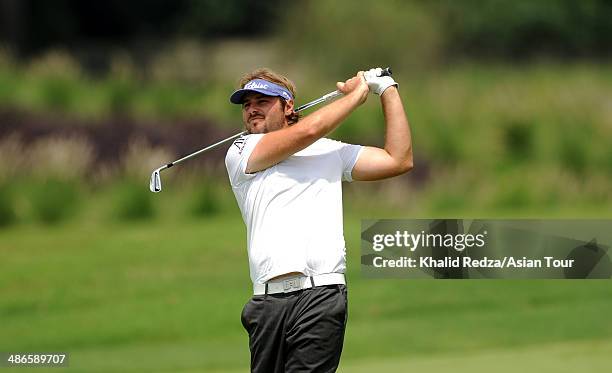 Victor Dubuisson of France in action during round two of the CIMB Niaga Indonesian Masters at Royale Jakarta Golf Club on April 25, 2014 in Jakarta,...