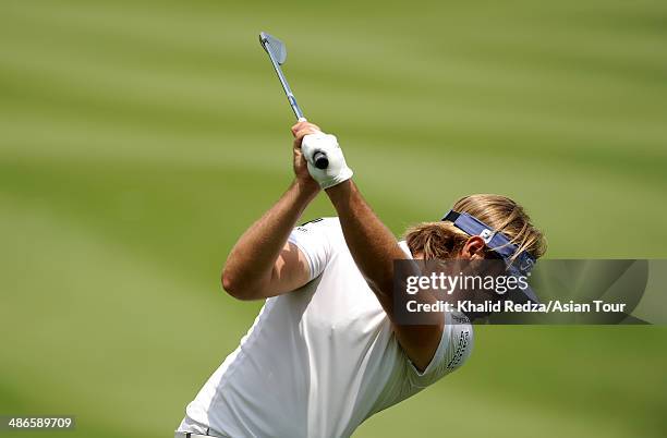 Victor Dubuisson of France in action during round two of the CIMB Niaga Indonesian Masters at Royale Jakarta Golf Club on April 25, 2014 in Jakarta,...
