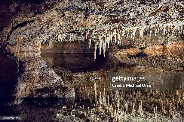 wicked reflection - stalagmite stock pictures, royalty-free photos & images