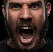 Close-up portrait of angry man