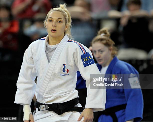 Automne Pavia of France is seen as she was defeated by Corina Caprioriu of Romania to reach the u57kg final and win the gold medal and her second...