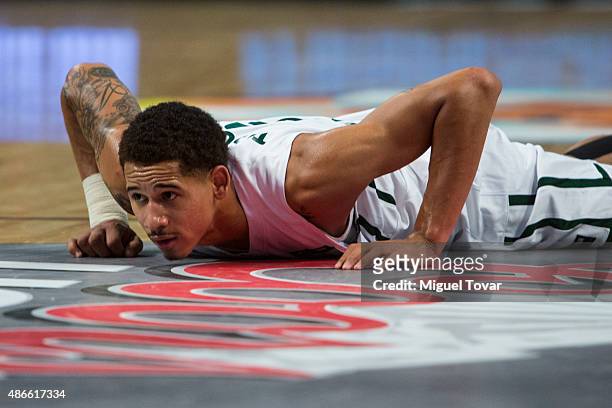 Juan Toscano of Mexico lies on the floor after been fouled during a match between Mexico and Uruguay as part of the 2015 FIBA Americas Championship...