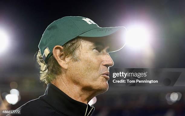 Head coach Art Briles of the Baylor Bears celebrates after the Bears beat the Southern Methodist Mustangs 56-21 at Gerald J. Ford Stadium on...