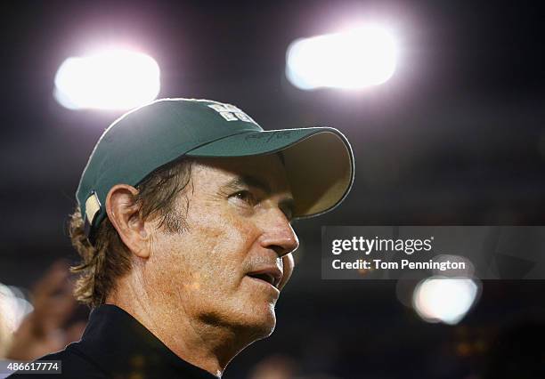 Head coach Art Briles of the Baylor Bears celebrates after the Bears beat the Southern Methodist Mustangs 56-21 at Gerald J. Ford Stadium on...