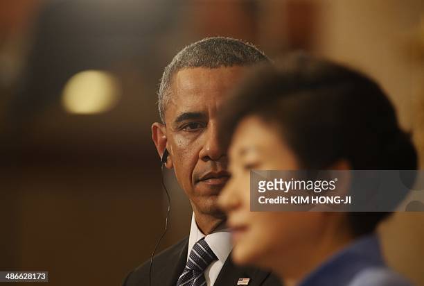 South Korean President Geun-hye Park and US President Barack Obama hold a join press conference at the Blue House in Seoul on April 25, 2014. Obama...