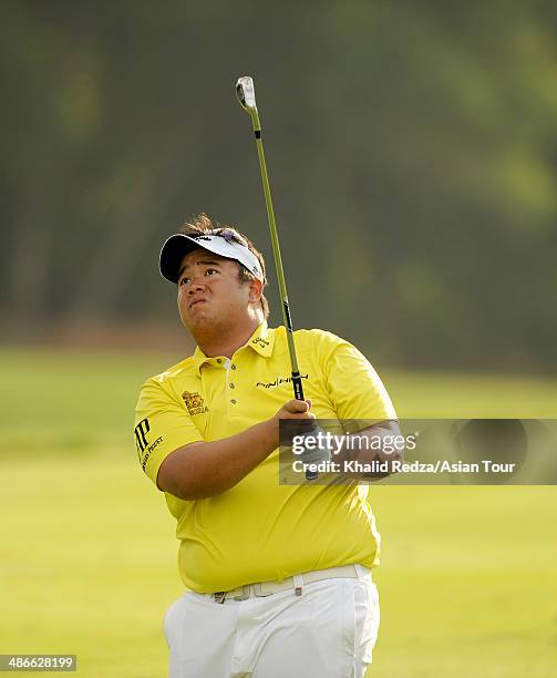 Kiradech Aphibarnrat of Thailand in action during round two of the CIMB Niaga Indonesian Masters at Royale Jakarta Golf Club on April 25, 2014 in...
