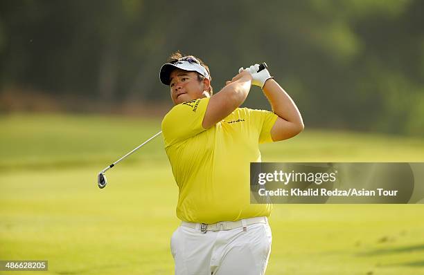 Kiradech Aphibarnrat of Thailand in action during round two of the CIMB Niaga Indonesian Masters at Royale Jakarta Golf Club on April 25, 2014 in...