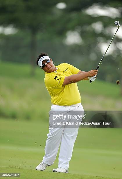 Kiradech Aphibarnrat of Thailand in action during round two of the CIMB Niaga Indonesian Masters at Royale Jakarta Golf Club on April 25, 2014 in...