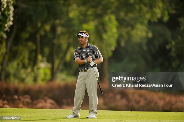 Louis Oosthuizen of South Africa in action during round two of the CIMB Niaga Indonesian Masters at Royale Jakarta Golf Club on April 25, 2014 in...