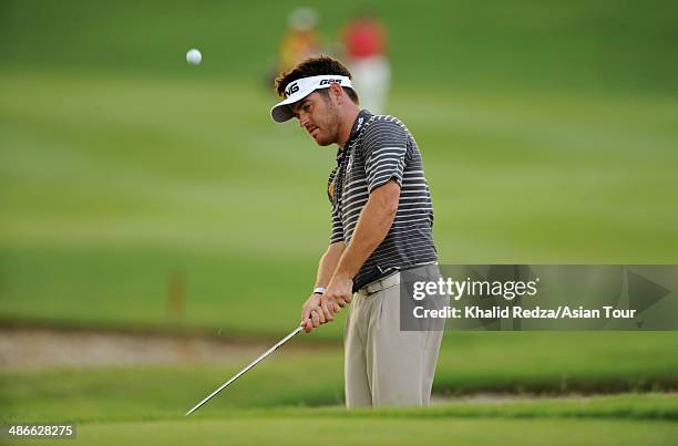 Louis Oosthuizen of South Africa in action during round two of the CIMB Niaga Indonesian Masters at Royale Jakarta Golf Club on April 25, 2014 in...