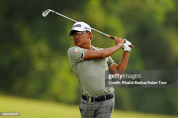 Nicholas Fung of Malaysia in action during round two of the CIMB Niaga Indonesian Masters at Royale Jakarta Golf Club on April 25, 2014 in Jakarta,...