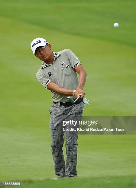 Nicholas Fung of Malaysia in action during round two of the CIMB Niaga Indonesian Masters at Royale Jakarta Golf Club on April 25, 2014 in Jakarta,...