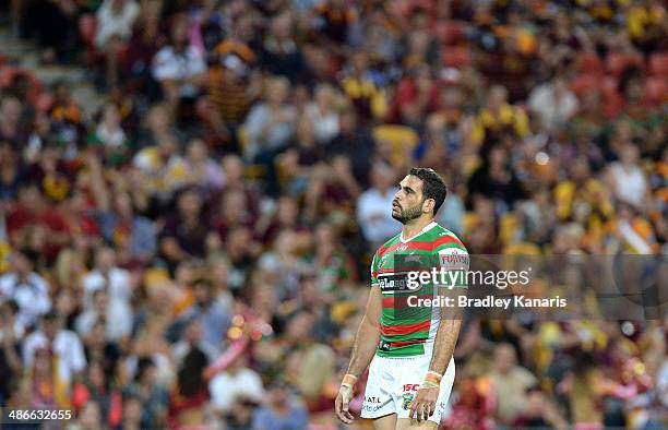 Greg Inglis of the Rabbitohs waits in the defensive line during the round 8 NRL match between the Brisbane Broncos and the South Sydney Rabbitohs at...