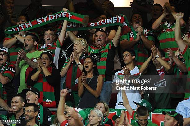 Rabbitohs fans cheer during the round 8 NRL match between the Brisbane Broncos and the South Sydney Rabbitohs at Suncorp Stadium on April 25, 2014 in...