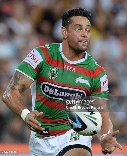 John Sutton of the Rabbitohs passes the ball during the round 8 NRL match between the Brisbane Broncos and the South Sydney Rabbitohs at Suncorp...