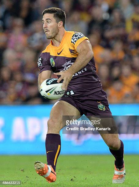 Ben Hunt of the Broncos passes the ball during the round 8 NRL match between the Brisbane Broncos and the South Sydney Rabbitohs at Suncorp Stadium...