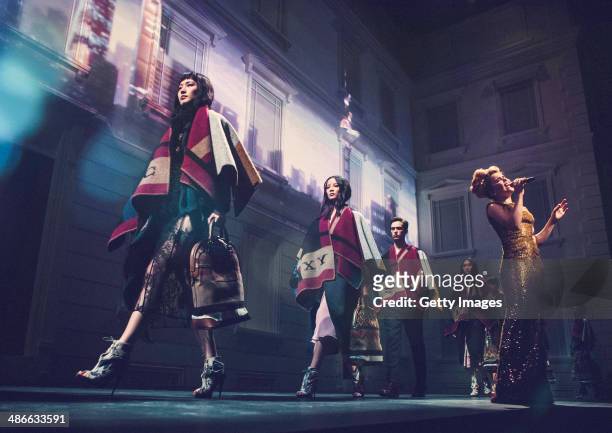Models walk the runway during the Burberry brings London to Shanghai event on April 24, 2014 in Shanghai, China.