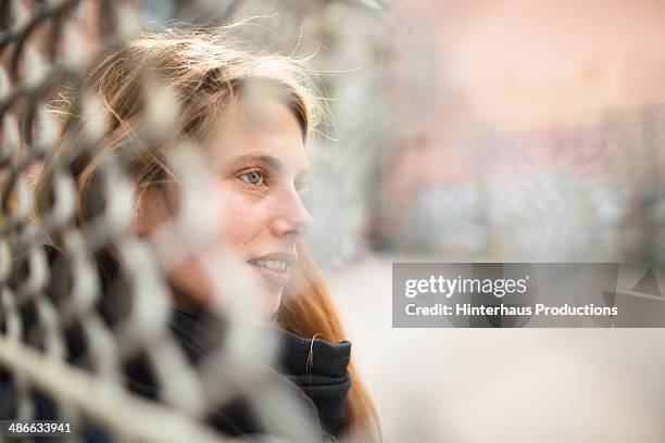 urban female portrait - young woman red hair urban stock pictures, royalty-free photos & images