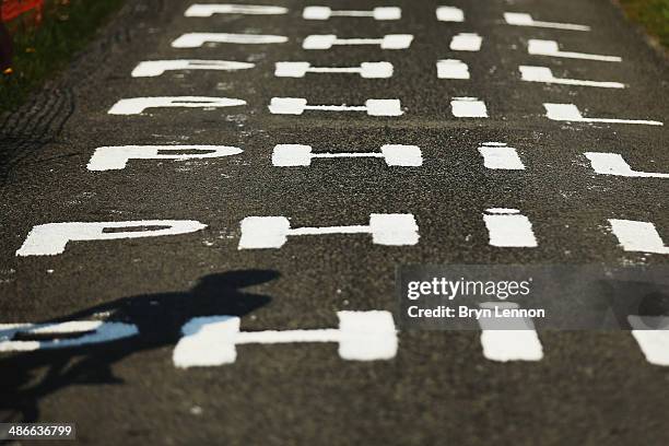 Philippe Gilbert fan painted the road on La Redoute during training for the 100th edition of the Liege-Bastogne-Liege road race on April 25, 2014 in...