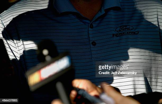 The shadow of NASCAR Hall of Famer Richard Petty is cast at Richmond International Raceway on April 25, 2014 in Richmond, Virginia.