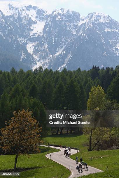 The riders descend from the Campo Carlo Magno towards the village of Dimaro during stage four of the Giro del Trentino from Val Daone to Monte...