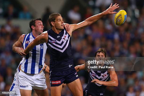 Aaron Sandilands of the Dockers wins a ruck contest against Todd Goldstein of the Kangaroos during the round six AFL match between the Fremantle...