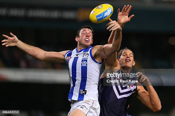 Todd Goldstein of the Kangaroos and Aaron Sandilands of the Dockers contest the ruck during the round six AFL match between the Fremantle Dockers and...