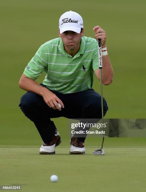 Ben Martin reacts after a double bogey on the 18th during Round Two of the Zurich Classic of New Orleans at TPC Louisiana on April 25, 2014 in...