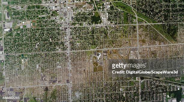 This is DigitalGlobe via Getty Images satellite imagery of the path of the May 22, 2011 EF-5 tornado that tore through Joplin, Missouri. The tornado...