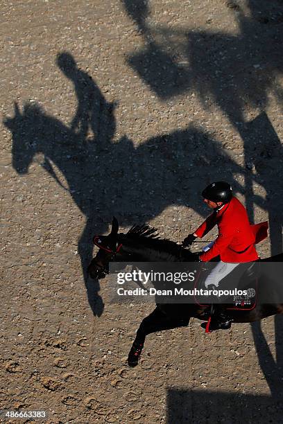 EHans-Dieter Dreher of Germany on Embassy II competes in the CSI5* Table A with one jump-off against the clock during day 2 of the Longines Global...