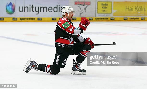 Philip Gogulla Koeln celebrates after scoring the 2nd goal in game five of the DEL final play-offs between Koelner Haie and ERC Ingolstadt at Lanxess...