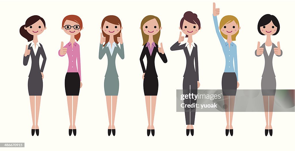 Business women gesturing thumbs up