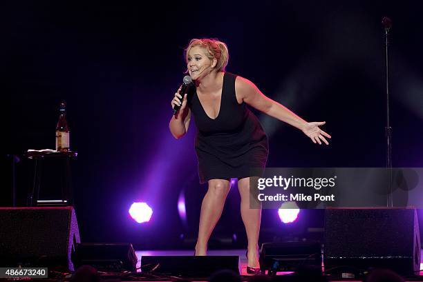 Comedian Amy Schumer performs during the Oddball Comedy and Curiosity Festival at the Nikon at Jones Beach Theater on September 4, 2015 in Wantagh,...