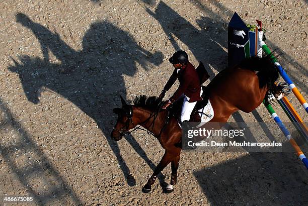 Bassem Hassan Mohammed of Qatar on Primeval Dejavu competes in the CSI5* Table A with one jump-off against the clock during day 2 of the Longines...