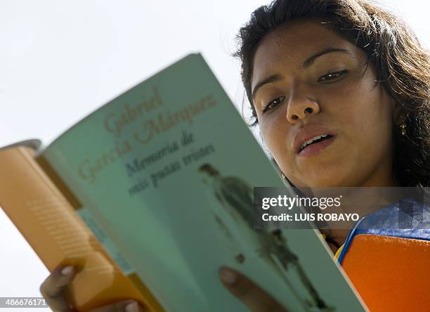 Student reads the novel "Memoria de mis putas tristes" by late Nobel Prize laureate in Literature Gabriel Garcia Marquez, in Cali, department of...