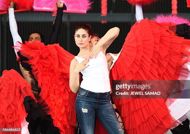 Bollywood actress Kareena Kapoor and dancers rehearse on stage at the Mid Florida Credit Union Amphitheater ahead of the IIFA Magic of the Movies on...