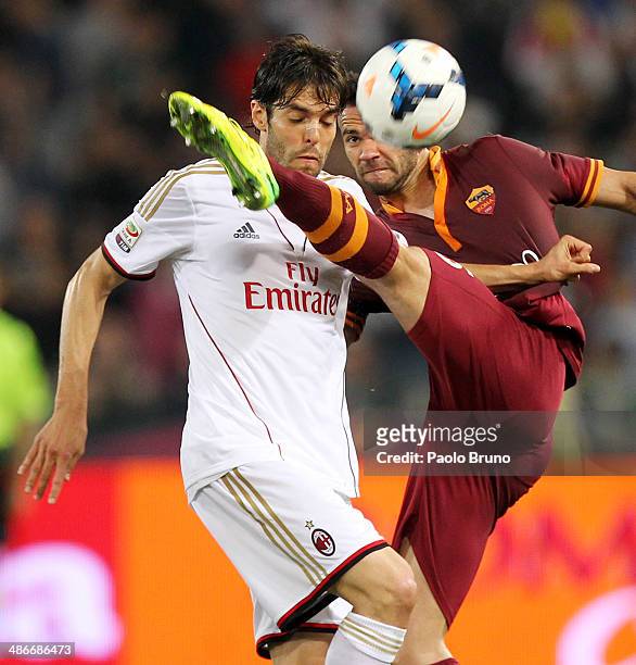 Ricardo Kaka' of AC Milan competes for the ball with Leandro Castan of AS Roma during the Serie A match between AS Roma and AC Milan at Stadio...