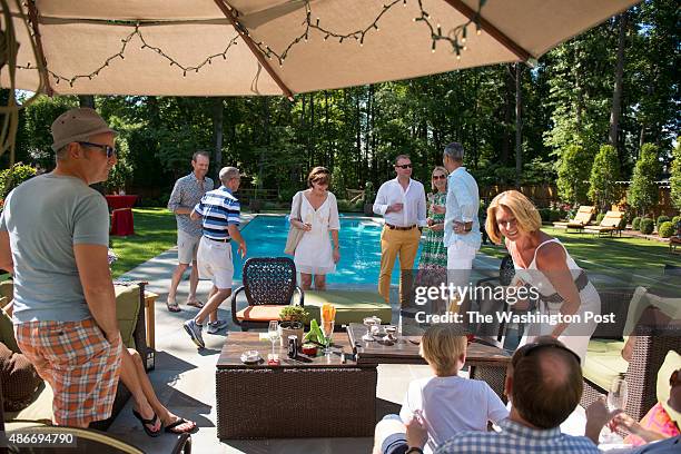 Greta De Keyser and Bart Vandaele regularly entertain in their spacious backyard in Alexandria, Virginia on September 06, 2014.