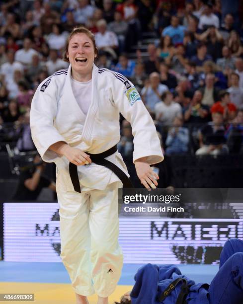 Kim Polling of Holland jumps with joy after throwing Laura Vargas-Kock of Germany for ippon to win the u70kg gold medal at the Montpellier European...