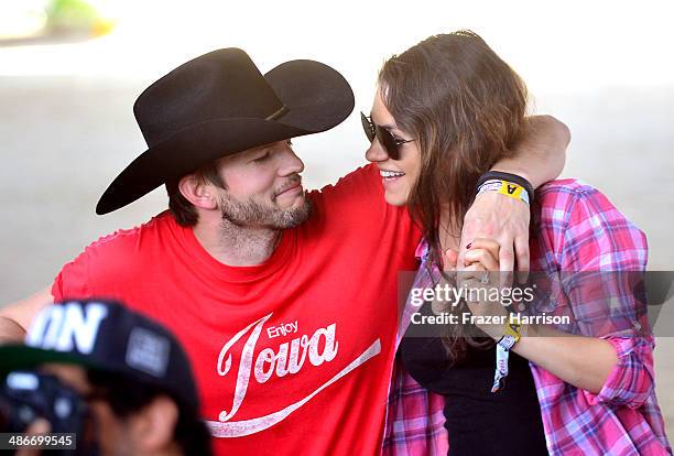 Actors Ashton Kutcher and Mila Kunis attend day 1 of 2014 Stagecoach: California's Country Music Festival at the Empire Polo Club on April 25, 2014...