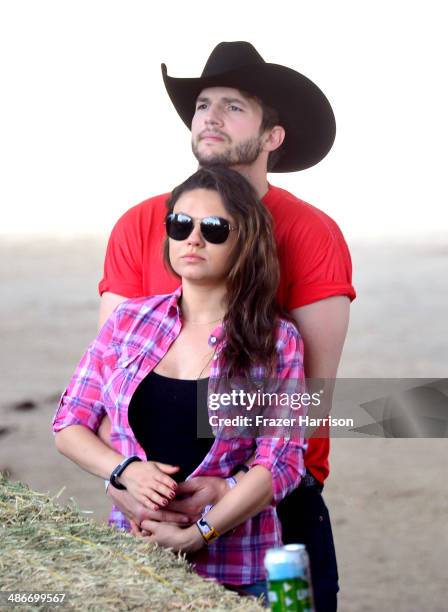 Actors Ashton Kutcher and Mila Kunis attend day 1 of 2014 Stagecoach: California's Country Music Festival at the Empire Polo Club on April 25, 2014...