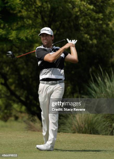 Erik Compton tees off on the 11th during Round Two of the Zurich Classic of New Orleans at TPC Louisiana on April 25, 2014 in Avondale, Louisiana.