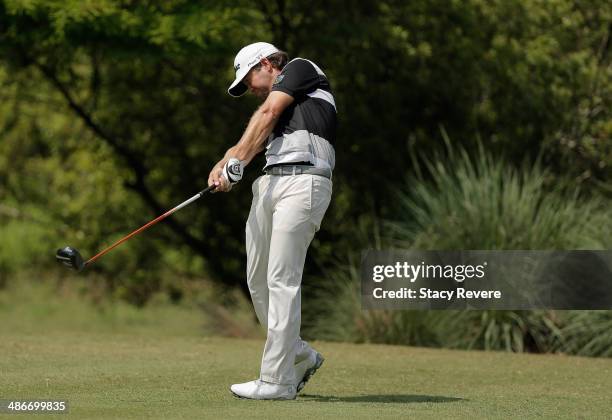 Erik Compton tees off on the 11th during Round Two of the Zurich Classic of New Orleans at TPC Louisiana on April 25, 2014 in Avondale, Louisiana.