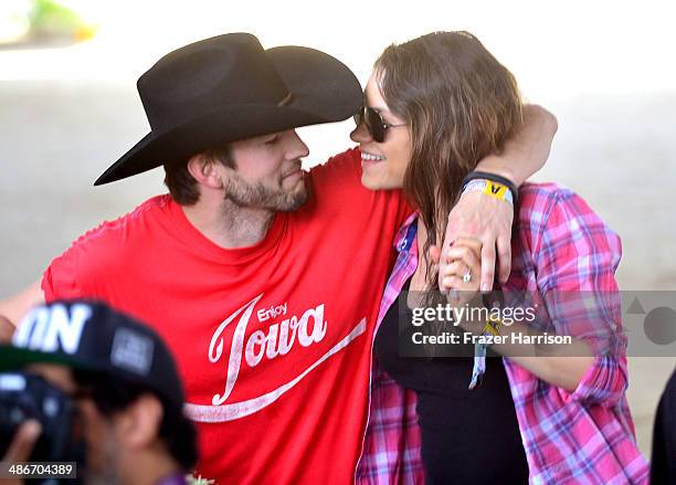 Actors Ashton Kutcher and Mila Kunis attend day 1 of 2014 Stagecoach: California's Country Music Festival at the Empire Polo Club on April 25, 2014...