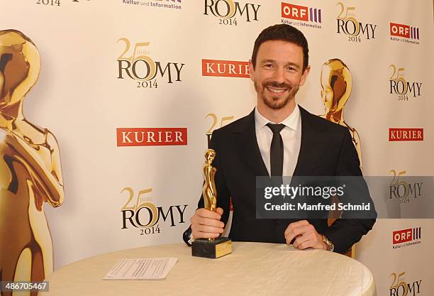 Oliver Berben poses with the Romy statue at the Romy 2014 Academy Awards at Hofburg Vienna on April 24, 2014 in Vienna, Austria.