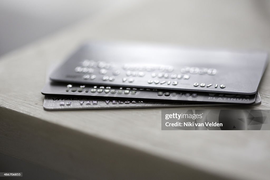 Credit cards on a desk.