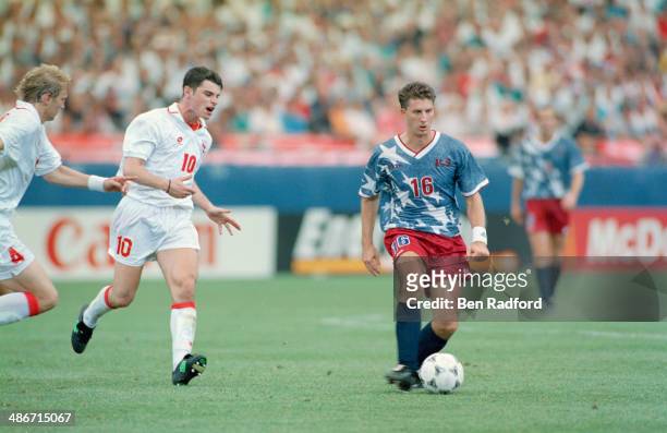 American soccer player John Harkes playing for the USA against Switzerland in a FIFA World Cup Group A match at Pontiac Silverdome, Pontiac,...