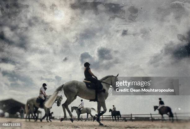 General view as riders and horses warm up in the paddock during day 2 of the Longines Global Champions Tour of Antwerp at the Waagnatie on April 25,...