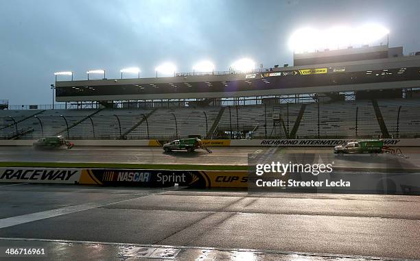 Air-Titan 2.0 track dryers run on the track after rain at Richmond International Raceway on April 25, 2014 in Richmond, Virginia.