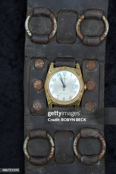 Martial arts legend Bruce Lee's personally owned vintage Timex brand 1970's wristwatch on a heavy leather band with hardware decoration is seen on...